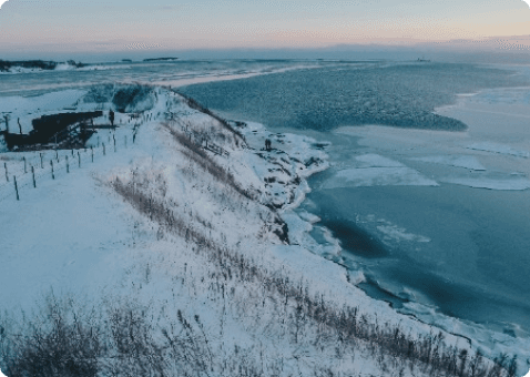 Snow-covered mountain aerial view